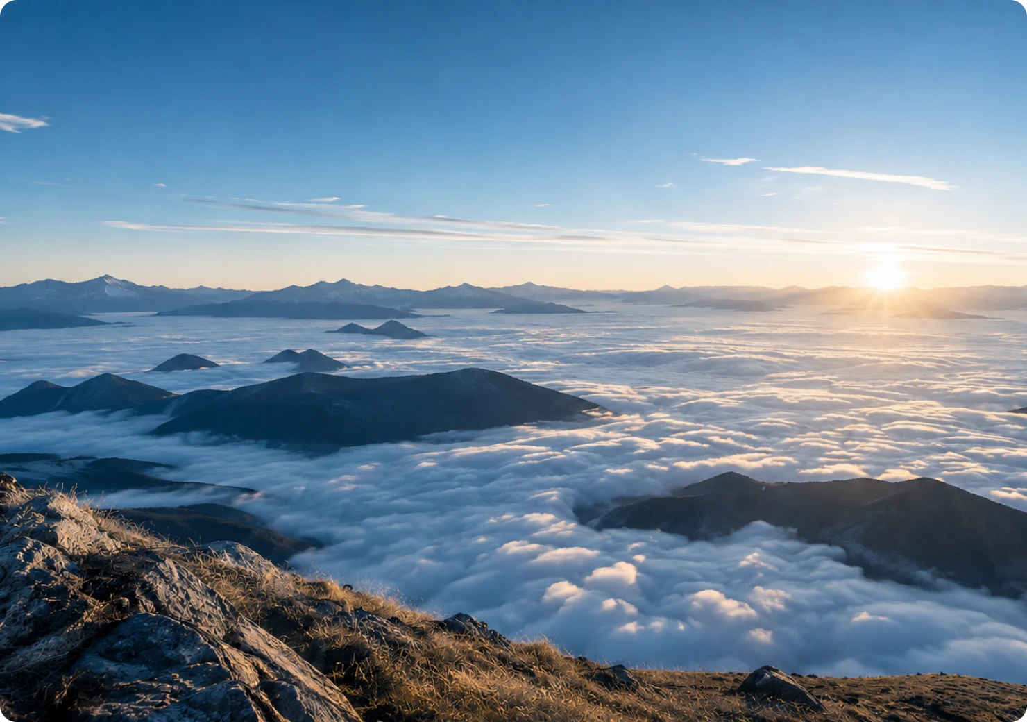 Sunrise above a sea of clouds representing CHAMPION’s corporate mission